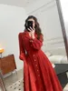Lässige Kleider 2023 Rotes Kleid Langarm Temperament High End Sense Französische Damenbekleidung Herbst und Winter