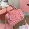 Bolso de diseñador Matelasse lujos el bolso de mano Bolso mini pochette para mujer Maquillaje para hombre Bolso bandolera de compras Bolsos de hombro de bolos de cuero genuino