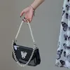 Sacs de soirée Designer sous les bras sac 2023 été PU papillon motif perle chaîne brillant laque cuir une épaule bandoulière