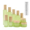 Top Fashion Bouteille en verre vert givré Pot de crème Spray Lotion Pompe Bouteilles Récipient cosmétique 20 ml 30 ml 40 ml 60 ml 80 ml 100 ml 120 ml avec couvercles en bois imités