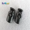 100 pçs Cord Lock Stopper Plastic Barrel Spring Toggle Black 28mm 14 5mm 11mm Para Bolsas Garments2247