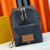 2023-Mochilas escolares de diseñador Bolso de moda clásico Mujeres Hombres Mochila de cuero Bolsas de lona Monederos unisex Tote