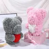 Flores decorativas coronas 2023 oso de rosas de pie peluche artificial con corazón para el Día de San Valentín cumpleaños novia regalos