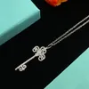 Nouveau Style Designer 925 Argent Plaqué Pendentif Colliers Haut De Gamme Cuivre Matériel Marque Lettre Acier Joint Chaînes Incrusté Cristal Géométrie Clé Collier Bijoux Cadeau