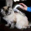 The latest pet electric hair cleaner comes with a box device hair, portable pet massage cleaning vacuum cleaner