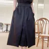スカート 2023 エレガントな A ラインミッドレングススカート滑走路女性ハイウエスト固体ポケット傘形の裾プリーツピンク、白、黒