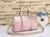 L Designer Bag Spring Sunrise Series التدرج الأمتعة للرجال في حقيبة يد سفر جسم السفر في المدينة حقيبة ظهر كبيرة للسعة