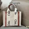 Handen Designer canvas zomertas tassen outlet woody 2024 bakken tas vrije tijd Japanese cloee geprinte brief winkelen grote capaciteit mode 91rj