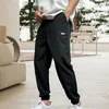 Spodnie męskie Spodnie joggery Modne męskie spodnie z szerokimi nogawkami Luźne spodnie dresowe Kurczące mankiety Casual