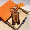 Tasarımcı Keychain PU Hayvan Klasik Deri Anahtar Kezlik Pendenif çanta kolye cüzdan kahverengi çiçek mini anahtarlık#