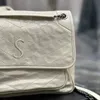 Projektantka Klasyczna Niki Cross Body Tote Bag ręka na zewnątrz oryginalne skórzane luksusowe luksusowe makijaż męskie torby na ramię