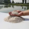 Der Hersteller bietet naturfarbenen Sand für den Bau von Außenwänden mit vollständigen Spezifikationen und Farben des farbigen Sandes