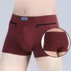 Culotte anti-vol poches à fermeture éclair mi-hauteur sans couture élastique hommes culottes couleur unie u-bump mâle Shorts slips usure quotidienne