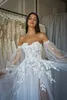 Romantique Puffy Long Manches en tulle une ligne robes de mariée Aso Ebi en dentelle florale appliquée chérie robes nuptiales élevées