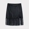 Spódnice damskie czarna satynowa spódniczka Mini z frędzlami 2023 wiosna wysokiej talii moda damska Vintage Street Slim Short