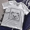Nieuwe 23ss Italië Heren dames t-shirts Kleding Gevulde beer Grafische brief print vrije tijd Modemerk paar ontwerper Zwart wit coach dames heren tshirt