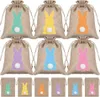 24pcs / set sacs de toile de jute de pâques sac de lapin mignon drôle lapin oeuf collection grappes emballage de bonbons petite pochette cadeau avec cordon de serrage pour la décoration de faveur de fête