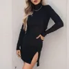 Fritidsklänningar Stretch Bodycon Kort klänning Kvinnor Enfärgad Ståkrage Body Långa ärmar Slitficka Vestidos Para Mujer