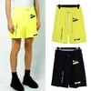 Mens Summer Designer Shorts Mode Lâche Femmes Streetwear Vêtements Séchage Rapide Lettres Imprimé Pantalon Street Style