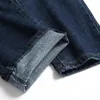 Męskie dżinsy męskie kieszenie na kolanach Biker Streetwear plisowana łatka ciemnoniebieskie spodnie jeansowe ze stretchem wąskie proste spodnie