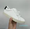 Diseñador de zapatos casuales para mujer para hombre zapatos de tablero tipos de cómodas zapatillas de deporte para parejas de cuero de vaca