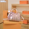 Bolsos de hombro para mujer al por mayor de fábrica 5 colores bolso con estampado de dibujos animados dulces bolsos con cinta de lazo lindo mochila de cuero en contraste de moda callejera 137 #