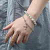 Link Bracelets Korean Double Cross Pearl Bracelet Female Design Feeling Cold Wind Small Adorn Article Hip-hop Sweet Cool Hand String