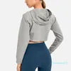 "Felpa con cappuccio corta dalla vestibilità rilassata da donna - Top da yoga elegante per la corsa e gli sport all'aria aperta - Maglie a maniche lunghe per l'autunno e l'inverno - Perfette per l'allenamento e l'allenamento"