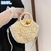 Factory wholesale ladies shoulder bags 2 colors summer cool hollow woven beach bag outdoor holiday straw leisure backpack small fresh shell fashion handbag 7060#