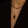 23070506 DIAMONDBOX collier bijoux femme NOIR AGATE OVALE pendentif au750 JAUNE or ENTHIC petite fille mode must have cadeau d'anniversaire vente