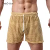 Men s Shorts Sexy Hollow Out European Style Casual Beach Short Cross pant Black Men See Through Fetish Loose Drawstring pants 230707