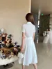 Projektantowe sukienki dla kobiet moda lato Summer New Bubble Rleeve Trójkąt krótka koszulka Płaszcz Slim A-Line Pleted Half Spirt Set Woman