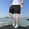 Herrshorts Sommar Enfärgad Sport Casual För tonåringar Mångsidigt mode Snabbtorkande Lös strand 5-punktsbyxor Herr