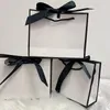 Confezione regalo 10 pezzi Regali con logo personalizzato Sacchetti di carta Papillon nero Pacchetto di nozze per gioielli Compleanno Gitfs Piccole imprese