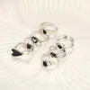 One pack of 7 Hot Selling Ladies Personality Sweet Black Drop Glaze Zircon Spade Love Ring Set of 7