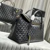 Ad alta capacità ES in pelle trapuntata Duffle Bag Danni Designer Borse da donna Viaggia per bagagli neri da bagagli da uomo Tote Pochette Luxury Clutch Spalla a croce Cross Body Shopper Borse