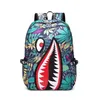 Designerski plecak z wzorem rekina może ładować baterię telefonu komórkowego Zaawansowany skórzany plecak unisex o dużej pojemności Young Fashion Cartoon Pattern Backpack