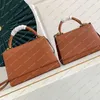 10A Ladies Fashion Casual Designe Luxury TWIST ONE HANDLE Shoulder Bag Crossbody TOTE Handbag High Quality All steel hardware and imported cowhide material