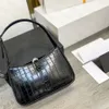 Bolsos de noche para mujeres de diseñador Temperamento de letra Temperamento de cuero de la dama Bolsos de cocodrilo de moda de la moda