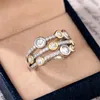 結婚指輪 Huitan 特別に興味のあるデザイン女性フル舗装 CZ ストーンツートンカラーのファッション多用途女性アクセサリーパーティージュエリー