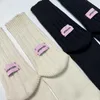 Женские носки корейская игла толстая нить вязаная средняя труба хлопок японская простой розовый лейбл Мужчины пары спортивны сложены