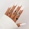 One pack of 7 Hot Selling Ladies Personality Sweet Black Drop Glaze Zircon Spade Love Ring Set of 7