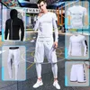 Tute da uomo Tuta da corsa da uomo Allenamento Fitness Set di abbigliamento sportivo Leggings a compressione Abbigliamento sportivo Palestra Pantaloni sportivi attillati Rash Guard Lycra 230707