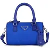 حقيبة المرأة 2023 جديدة P كيس الأسطوانة نايلون كروس جروسي حقيبة الكتف حقيبة الكتف 11 لون