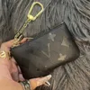 여성 패션 키 파우치 Pochette Cles Designer Mens 키 카드 홀더 동전 지갑 고급 미니 지갑 미니 지갑 가죽 Caitlin_fashion_bags