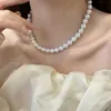 Colliers pendentif collier de perles femmes 2023 nouvelle lumière luxe petit et populaire chaîne de collier de style occidental sensation avancée accessoires de chaîne de cou