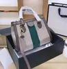 Tasarımcı çanta çanta yüksek kaliteli lüks omuz çantaları moda kadın çapraz kanvas flep baskılı çanta bayanlar çantası gündelik debriyaj tote 2024 çanta cüzdanları