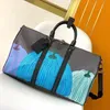 Designer de couro Homens Mulheres Bolsas de Duffel A mala de grande capacidade Bagagem esportes para mochilas ao ar livre Bolsas de transferência de bolsas de transferência de bolsas de bolsas UNissex