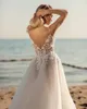 Sexy V Neck Beach A Line Wedding Dresses Lace Appliques Backless Bridal Gown with Slit Backless Shiny Skirt robe de mariee