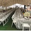 Atacado moderno ao ar livre jardim casamento dobrável plástico PP resina cadeiras brancas portáteis para eventos